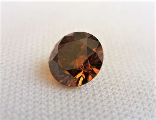 *0.9360 cts Round Brilliant Vivid Orangy Brown* Certified - 100% Natural Diamond