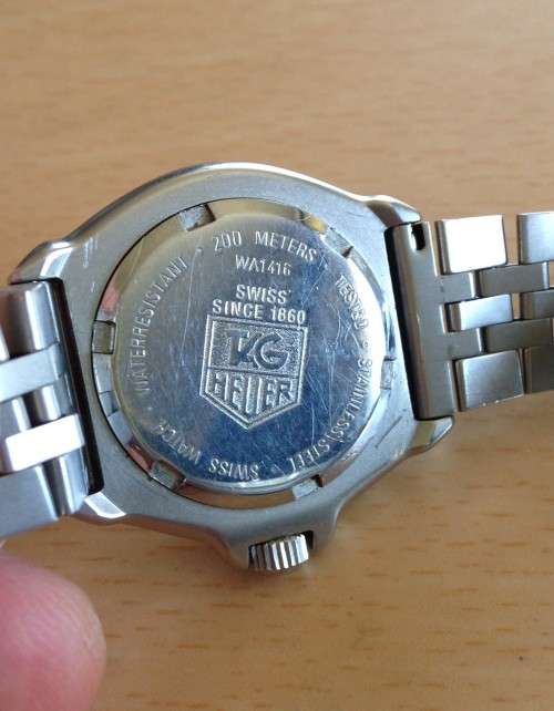 Vintage ladies Tag Heuer. Rare black & neon, "Heuer" on crown, not logo, wet suite extetion