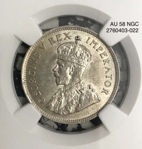 Rare 1927 SA 1 shilling in a truly rare top condition. NGC AU 58. Virtually UNC. Reduced price.