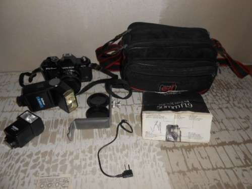 YASHICA FX -3 super 2000 CAMERA and 50mm LENS, 2 FLASHES, Wata Flash Grip and camera BAG