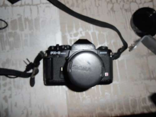 YASHICA FX -3 super 2000 CAMERA and 50mm LENS, 2 FLASHES, Wata Flash Grip and camera BAG