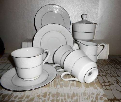 Part tea set. Fine China Japan. Silver Lace: Milk jug, Sugar bowl & 3 Duo¿s