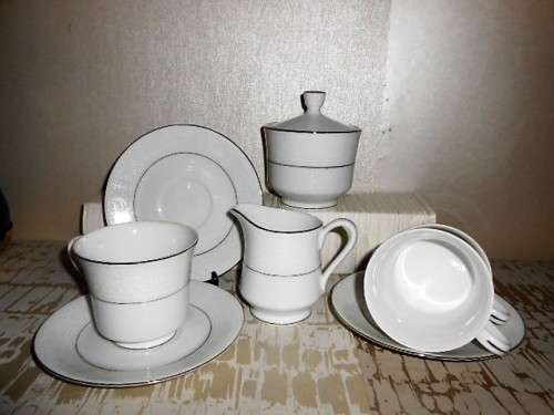 Part tea set. Fine China Japan. Silver Lace: Milk jug, Sugar bowl & 3 Duo¿s