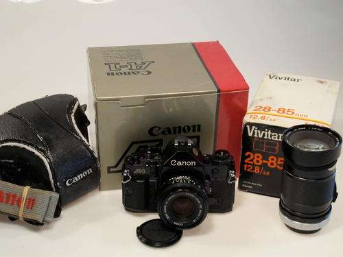 Canon A-1 with FD 50mm f1,8,Fast Vivitar 28-85mm f2,8**Excellent++,Boxed**