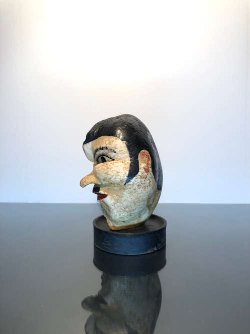 A Rare 19th Century Scrimshaw Hand Painted Whale Ear Bone