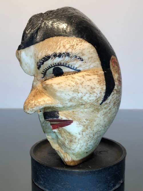 A Rare 19th Century Scrimshaw Hand Painted Whale Ear Bone