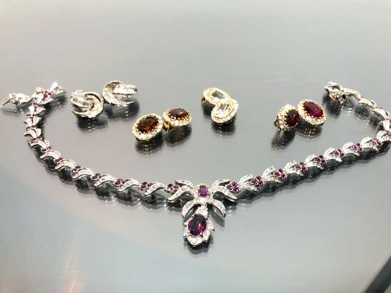 A Collection of Atwood and Sawyer Rhinestone Crystal Necklace and 4 Sets of Crystal Ear Rings