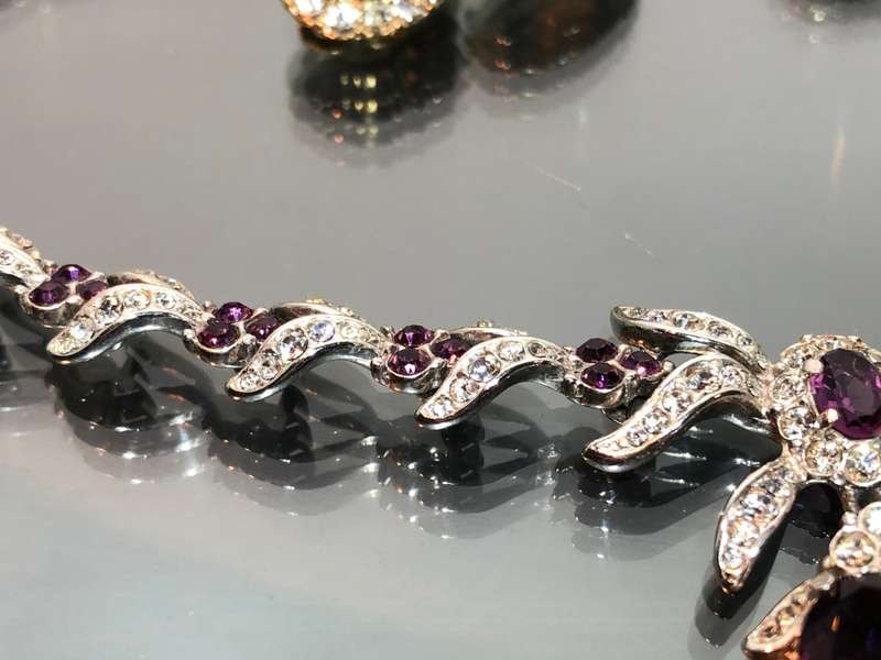 A Collection of Atwood and Sawyer Rhinestone Crystal Necklace and 4 Sets of Crystal Ear Rings