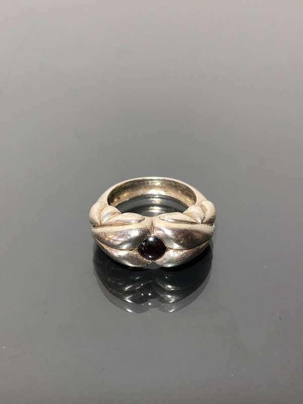 A Solid Silver and Garnet Gemstone Mens Ring