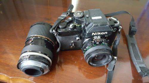NIKON A5 AND 2 LENS Cameras WORKING lens will need cleaning sold as is. Pleas check actual pictures.