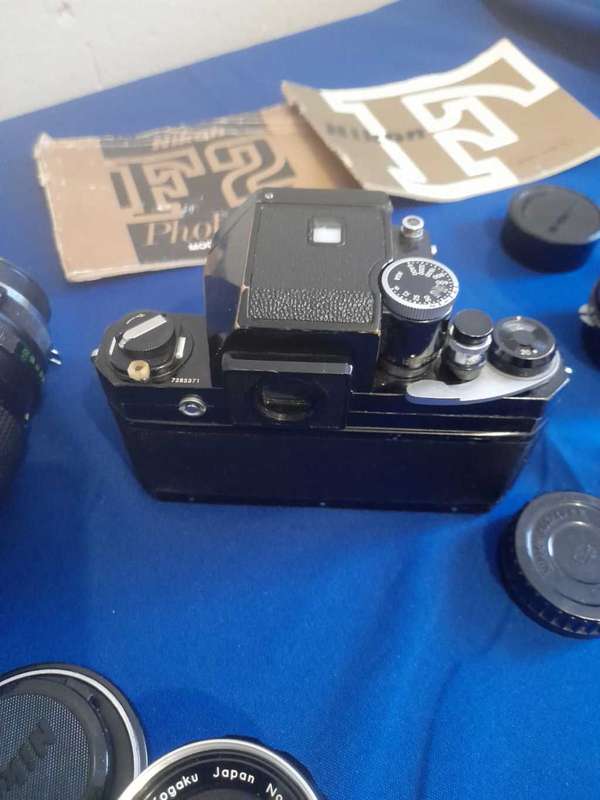 Nikon f black paint 35mm camera plus 4 lens