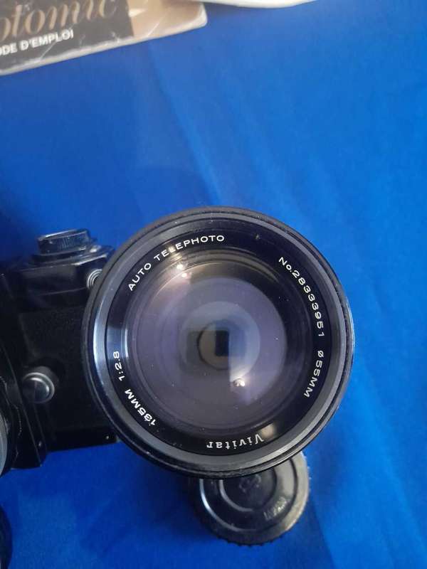 Nikon f black paint 35mm camera plus 4 lens
