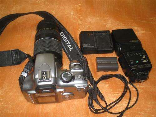 LATE ENTRY This is a second hand camera Minor evidence of  wear on top .  Comes with a  lens neck s.