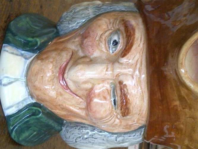 A large Royal Doulton CHARACTER JUG,   15cm high. No signs of damage or restoration.