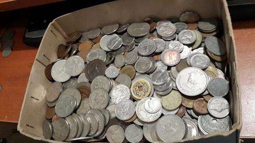 ONE BID FOR THE LOT Huge lot of   world  coins. I haven't counted them but I would estimate between