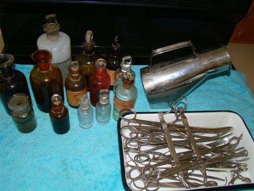 A BASIN WITH DOCTORS INSTRUMENTS OLD APOTHECARY BOTTELS SHIPPING WILL BE R40