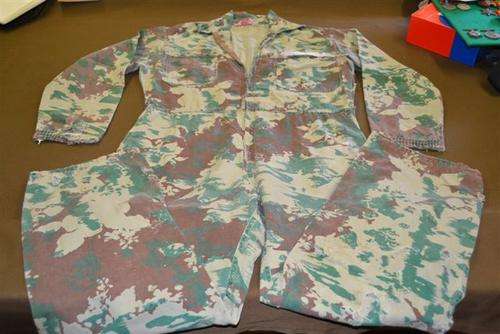 SAP 1st pattern camo overall. Not fixable. Lots of holes and tears.