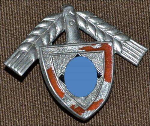 German badge with some damadge. Slightly bent.