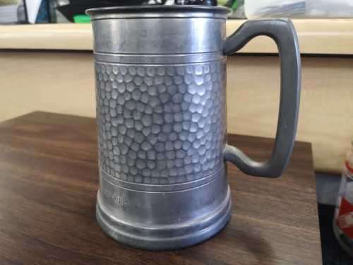 Antique tin jug