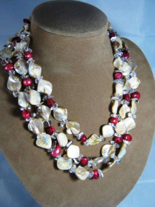 Triple Strand 13 mm red baroque pearl and white shell necklace