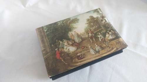 Delicate and romantic silk purse including an extra genuine leather purse