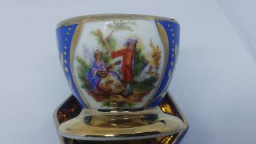 Stunning Blue and Gold ceramic romantic scene Egg cup and saltbush