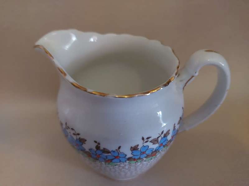 Delicate Tuscan China Rock Garden milk jug