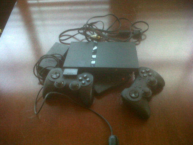 PLAYStation Console and as per photo
