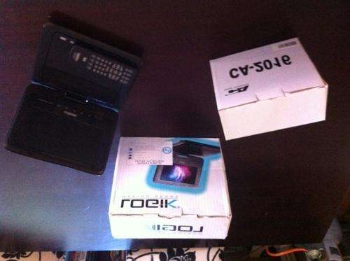 LATE ENTRY -Logic Portable DVD player with a set of external speakers still inbox
