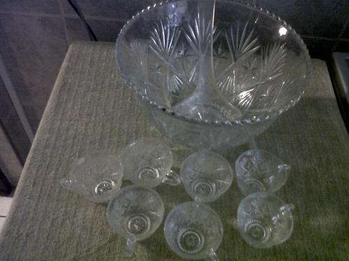 glass punch bowl with 7 matching glasses