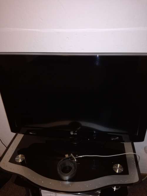 LG 32" tv looks brand new only used by guests in spare bedroom