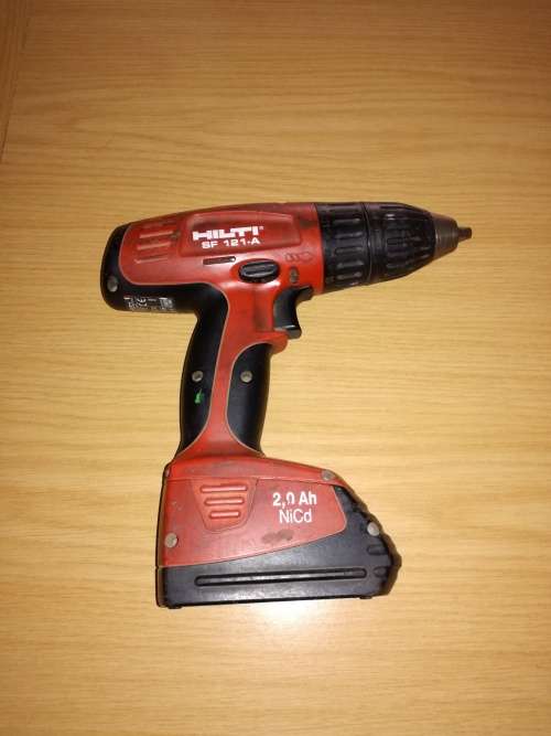 Hilti cordless drill comes with charger and original box. Works 100%