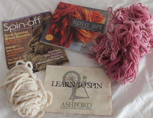 MAGAZINE ABOUT SPINNING AND BOOK ON SPINNING ART YARN, ALSO SOME HAND SPUN WOOL