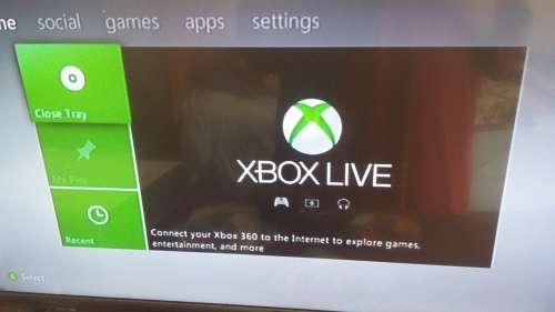 xbox 360 with 2 controllers and all cables and plays pirated games
