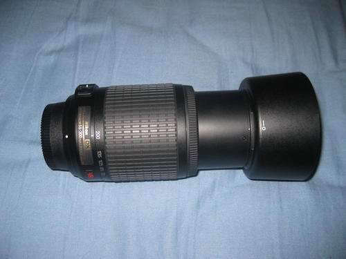 NIKON ZOOM LENS  DX VR AF-S NIKKOR 55-200MM Zoom lens.