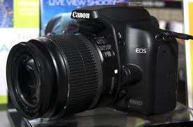 CANON  1000 D + 18 - 55mm  EF-S 1:3.5-5.6  III CANON ZOOM  LENS .