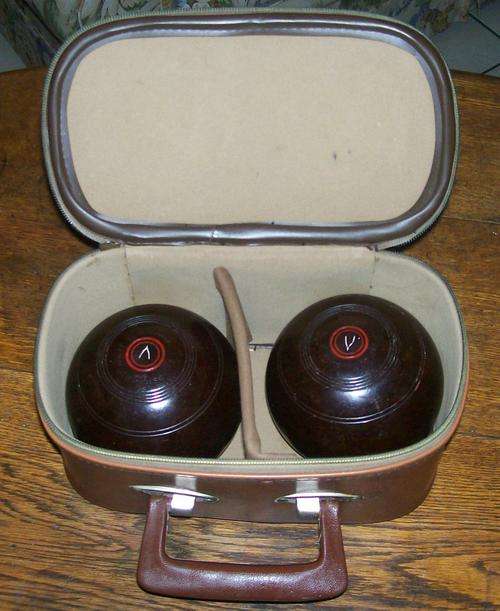 TWO SETS OF BOWLS IN THEIR VINTAGE CARRY BAGS!