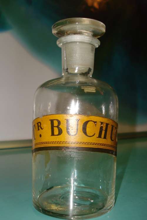 A Genuine Antique Vintage Buchu Apothecary pharmaceutical Bottle and matching stopper