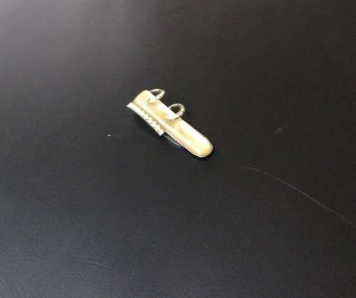 Vintage fur clip with mother of pearl type finish