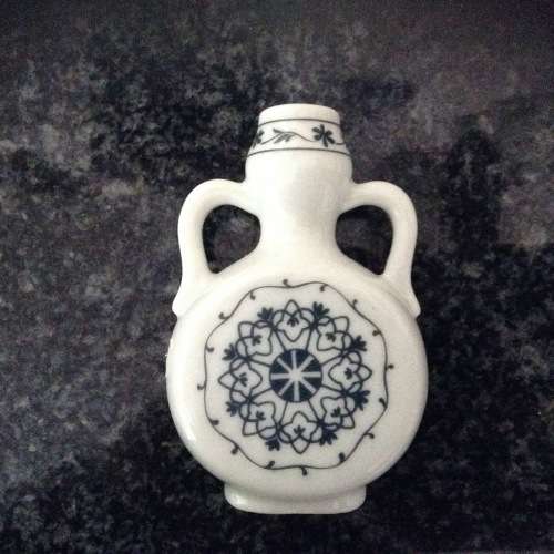 small blue and white vase