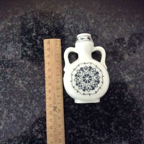 small blue and white vase