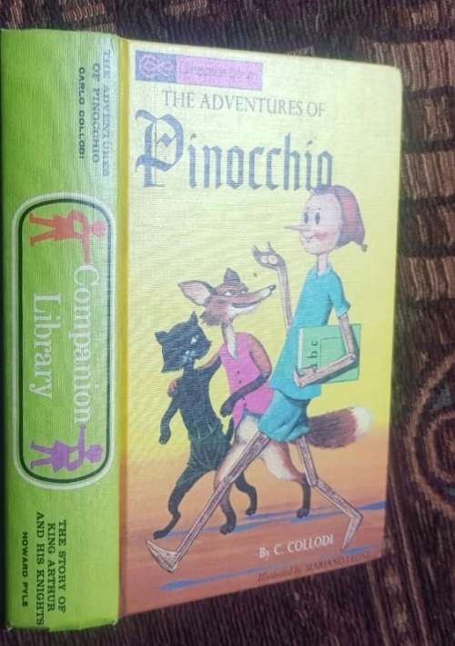 King Arthur and his knights and  The Adventures of Pinocchio, First Edition, two tales in one book