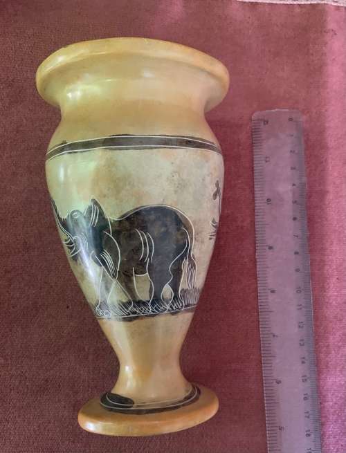 Ceramic vase with elephant images