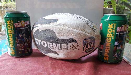 Rugby Super 14 Stormers collectible Ball AND two Fan Can puzzle sets.