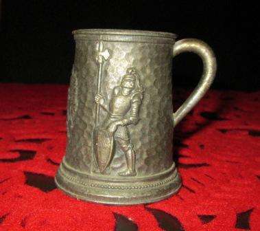 Small mug with embossed knight