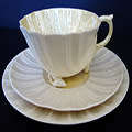 BELLEEK IRELAND TRIO -  SHELL CUP, SAUCER AND TEA/SIDE PLATE 1926 - 1946  3RD BLACK MARK - REG. 0857