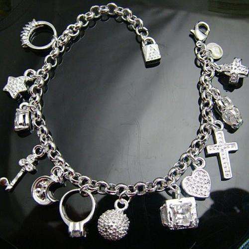 **CHARMING** 925 Sterling Silver Bracelet with Charms