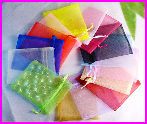 ORANGE ORGANZA BAGS