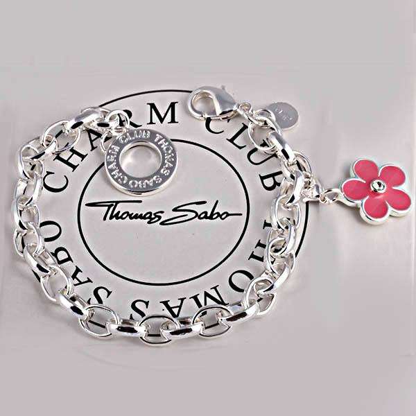Designer's Silver Bracelet with a Crystal Flower Charm*imported