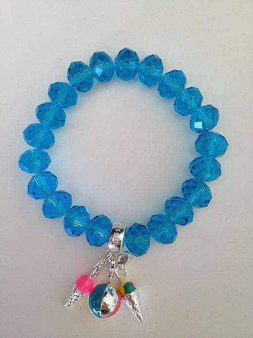 Designer's Silver and Blue Crystal bracelet with 3 Special Charms *imported